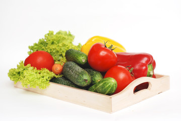 Fresh Summer Vegetables in Wooden Box Isolated. Organic Vegetables Vegetarian Vegan Health food Eatting