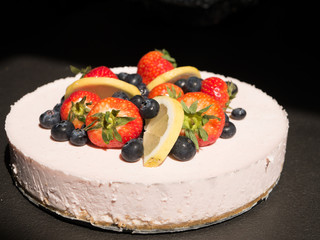 Colorful vegan strawberry cheesecake
