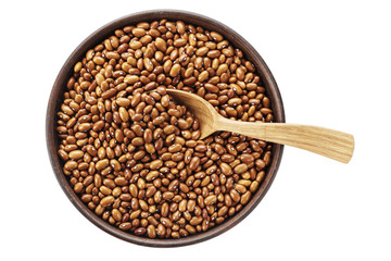 brown beans in a plate isolated