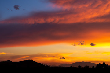 The beautiful sunset sky with the colorful clouds in summer