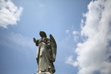 Christianity and Religious Iconography Angel Statue Figurine in a Graveyard