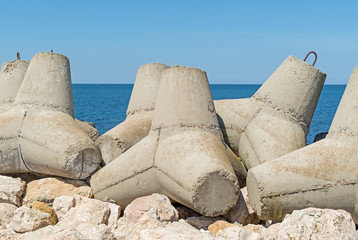 big breakwater on the sea