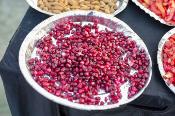 Pomegranate seeds in plate for salad