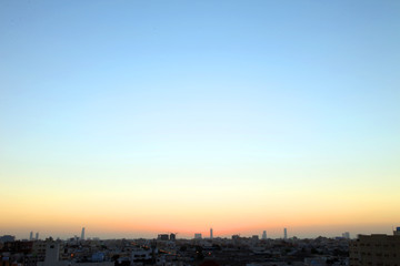 Fototapeta na wymiar Sunset scene with buildings silhouette in countryside of Jeddah, Saudi arabia