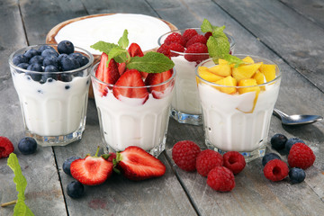 Yogurt and berry. Fresh fruit yogurt with fresh berries and peaches