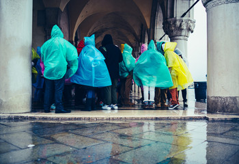People in raincoats