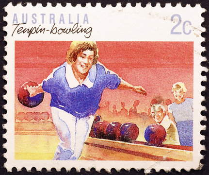 Woman playing ten-pin bowling on australian postage stamp