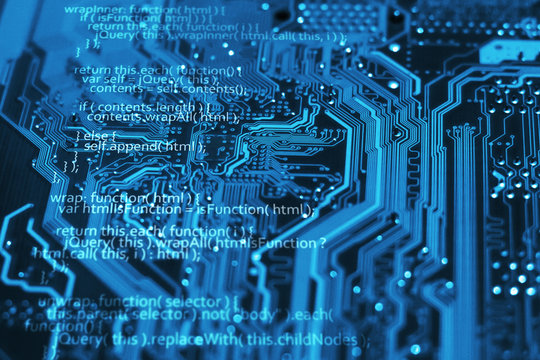 Programming language code on blue integrated circuit background. Program coding concept. Html, css and javascript.