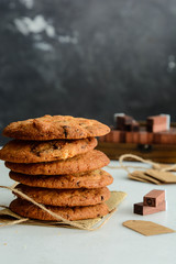 Chocolate cookies on wooden table. Chocolate chip cookies shot.