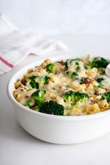 Casserole with pasta, chicken, broccoli and Bechamel sauce under a cheese crust