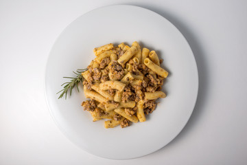 Plate of macaroni pasta with Bolognese ragù