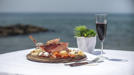 snack, appetizer, food, dinner, cheese, party, restaurant, delicatessen, meal, dish, table, celebration, event, cuisine, eating, buffet, variety