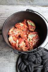 Cast Iron Dutch Oven Pasta Dinner On Wooden Background