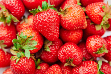 background from freshly harvested strawberries. Top view. red berry.