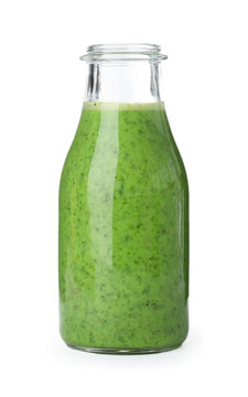 Bottle with delicious detox smoothie on white background