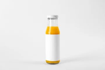 Poster de jardin Jus Bottle with delicious fresh juice on white background