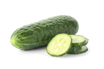 Whole and sliced fresh cucumbers on white background