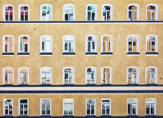 Classic yellow roughcast Swedish residential building