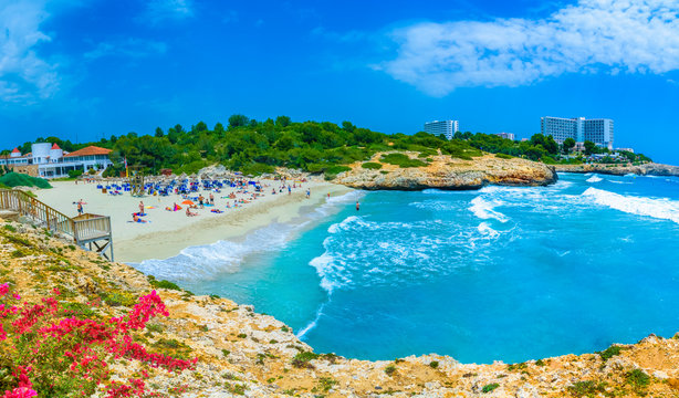 Cala Domingo resort and Tropicana beach in summertime holiday in Mallorca island, Spain