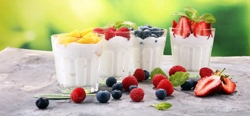 Yogurt and berry. Fresh fruit yogurt with fresh berries and peaches