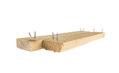 A board with nails on an isolated white background