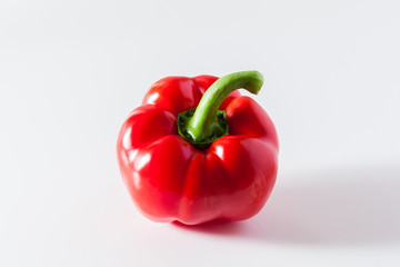 group of red ripe organic bell pepper  isolated on white. copy space
