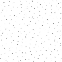 Repeated scattered rounded dots. Seamless pattern with gray spots on white background. Drawn by hand.