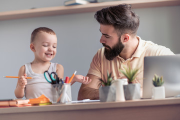 Busy father working from home