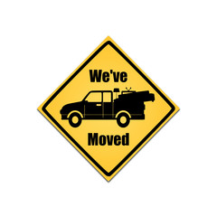 We've moved sign featuring a pickup truck