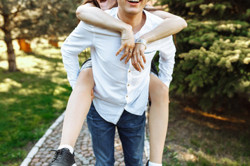 young, happy, loving couple, frolic and have fun in the Park, and enjoy each other, advertising,...