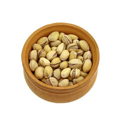 Heap of pistachio in a bowl isolated on white background