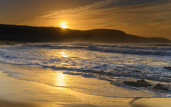 Sunrise Seascape with Sunburst over the Headland