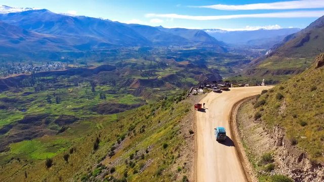 Colca Canyon in Peru aerial drone view.  It is Peru's third most-visited tourist destination and one of the deepest valleys in the world.  The Colca Valley is a colorful Andean valley.