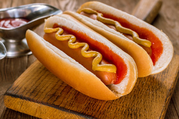 two classic hot dogs with ketchup and mustard