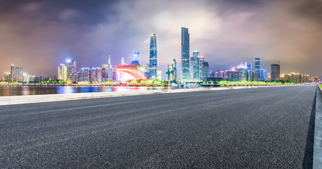 Fototapeta na wymiar asphalt highway and modern city skyline in Guangzhou at night,China