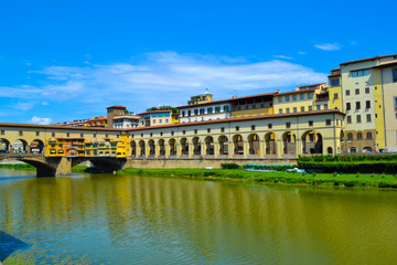 Ponte Vecchio (Vecchio Bridge) through Arno river, in Florence, Italy.