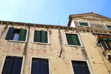 Fototapeta na wymiar Historic architecture with old medieval buildings in Venice, Italy, Europe.