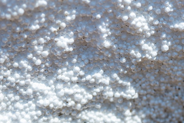 Styrofoam balls creating abstract texture or background.
