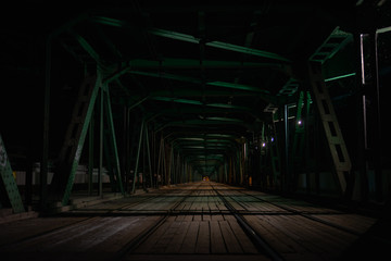 The tram tracks of Most Gdanski Bridge in Warsaw at night
