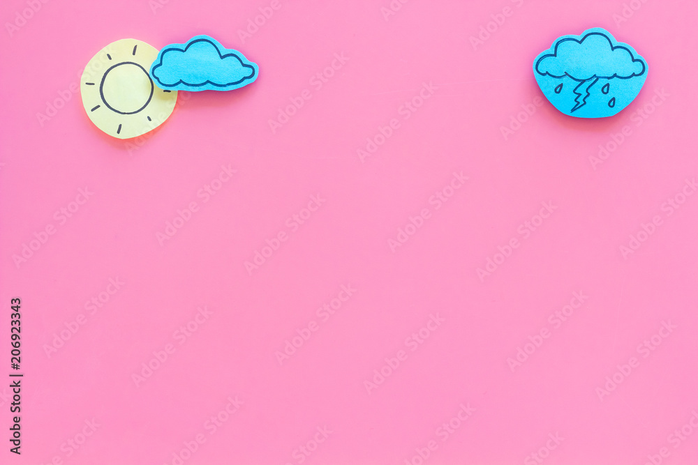 Wall mural clear and cloudly weather icons on pink background top view copy space