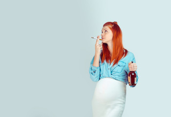 Woman in pregnancy smoking and drinking