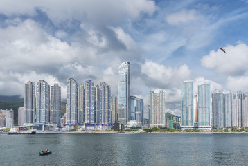 Fototapeta na wymiar high rise building and harbor in Hong Kong city
