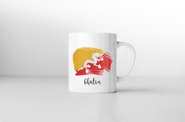 Bhutan flag souvenir mug on white background. 3D rendering.