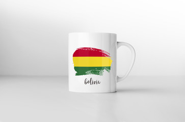 Bolivia flag souvenir mug on white background. 3D rendering.