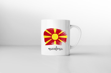 Macedonia flag souvenir mug on white background. 3D rendering.