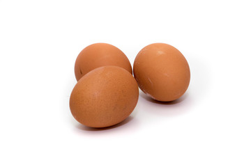 Three eggs on white background