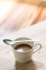 Close up coffee cup on the table.