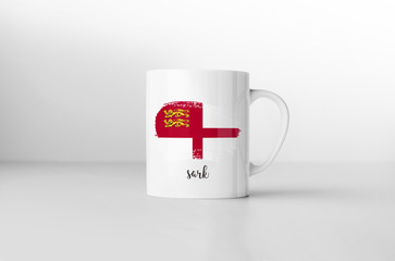 Sark flag souvenir mug on white background. 3D rendering.