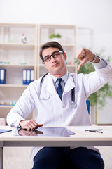 Young doctor sitting in the office