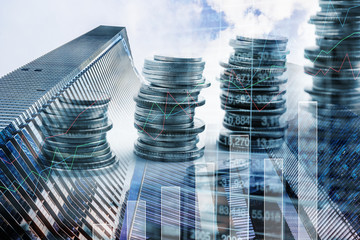 Double exposure rows of coins with common Modern business skyscrapers. for finance and business,Saving money and account finance bank business concept.